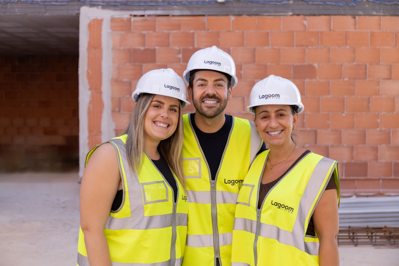 Three Lagoom Living colleagues at a development under construction